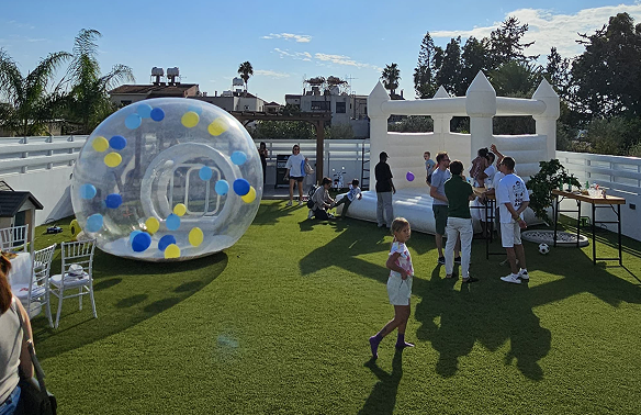 Kids playing in a bouncy castle